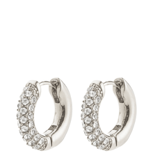 Silver hoop earrings with embedded crystals on a white background