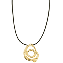 Gold spiral pendant on a black cord against a white background