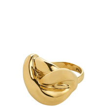 Gold ring with a knot design on a white background