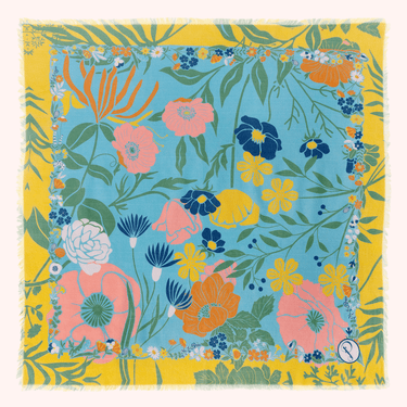Colorful floral patterned fabric with a yellow border