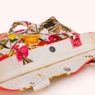 Floral-patterned sandal on a white background
