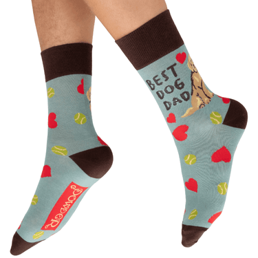 Sock with 'Best Dog Dad' text and dog graphics on a light blue background