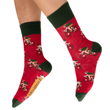 Red socks with bicycle-themed design on a white background