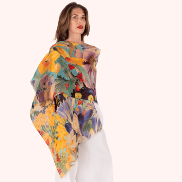 Woman wearing a colorful floral dress on a white background