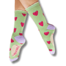 Green socks with red heart patterns on a white background