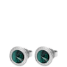 Silver cufflinks with green gemstones on a white background