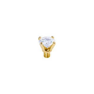 Gold-colored jewelry piece with a clear gemstone on a white background