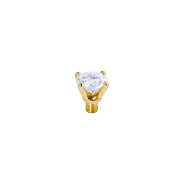Gold-colored jewelry piece with a clear gemstone on a white background