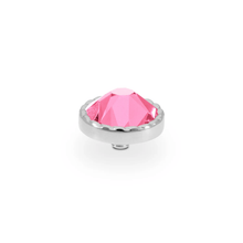 Pink gemstone in a silver setting on a white background