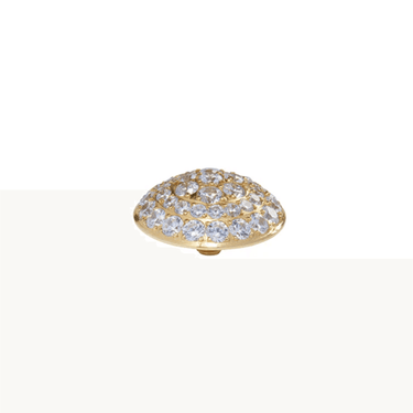 Gold and crystal decorative element on a white background