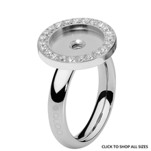 Silver ring with gemstones on a white background