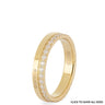 A gold eternity-style ring with a row of clear stones along the front, photographed on a clean white background. The inside of the band shows the brand name 'qudo' and metal stamp '58517.