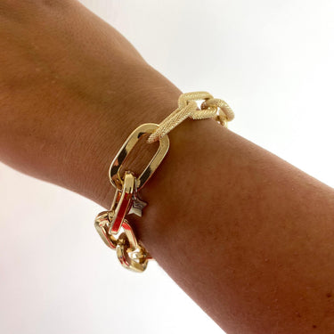 rebecca-diva-gold-half-textured-oval-link-bracelet-silver-clasp