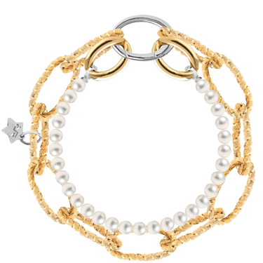 Multistrand bracelet with pearls and gold and silver accents on a white background