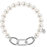 Pearl bracelet with silver clasp and star charm on a white background