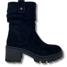 black suede ankle boot with a chunky black block heel and a small silver button detail on the top cuff, shown against a plain white background.
