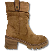 Pale brown suede ankle boot with a chunky block heel, rugged lug sole, and a decorative pull tab at the collar, shown against a plain white background.