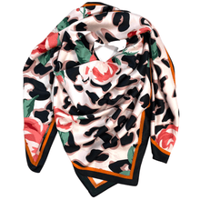 Multicolored scarf with floral and animal print design on a white background