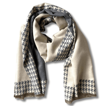 Beige scarf with houndstooth pattern on a white background