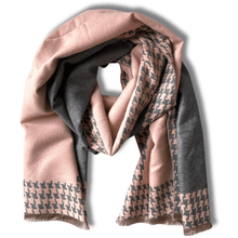 Multicolored scarf with houndstooth pattern on a white background