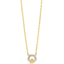 A delicate gold chain necklace featuring a pendant with a yellow gold lotus flower and a halo of small clear stones, set against a plain white background.