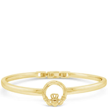 A polished yellow gold Claddagh bracelet with a crown and heart design, displayed on a clean white background.
