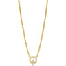 A delicate gold chain necklace featuring a double-ring pendant with a central clear gemstone, displayed against a solid white background.