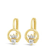 A pair of gold huggie hoop earrings with a small white flower and clear crystal center, shown on a plain white background.