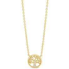 A delicate gold chain necklace featuring a circular pendant with a tree of life design and a small clear gemstone at the center, displayed on a clean white background.