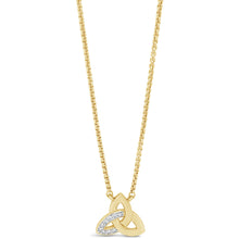 A gold necklace featuring a triquetra knot pendant with a row of small clear stones on one of the loops, displayed against a solid white background.