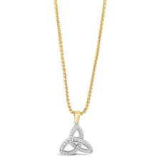 A gold chain necklace with a triquetra knot pendant, where the lower loop of the triquetra is paved with small clear stones, shown against a plain white background.