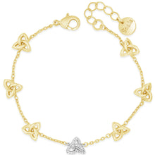 A delicate yellow gold chain bracelet featuring seven small triquetra knot charms and a central silver-colored butterfly charm, displayed on a clean white background.