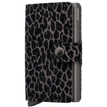 A Secrid Mini wallet featuring a black and gray leopard print pattern on the front cover, with a dark gray metal side bar and a snap-button strap closure.