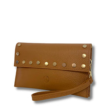 Brown leather wallet with gold studs on a white background