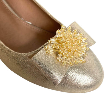 ladies gold small heeled shoes with bead on front