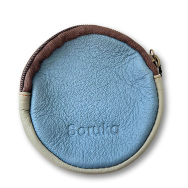 soruka-afra-round-leather-zip-purse-cow-print