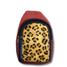 Red backpack with a leopard print interior on a white background