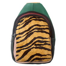 Backpack with tiger stripe pattern on a green background