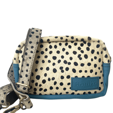 Polka dot handbag with blue accents and 'Boruko' branding on a white background