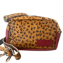 Leopard print pouch with a visible brand logo on a white background