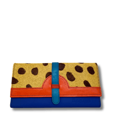 Multicolored wallet with spotted pattern on a white background
