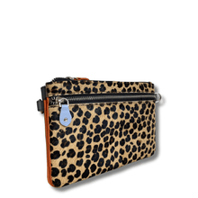 Leopard print pouch with a zipper on a white background