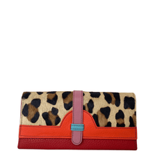 Leopard print wallet with red and pink accents on a white background