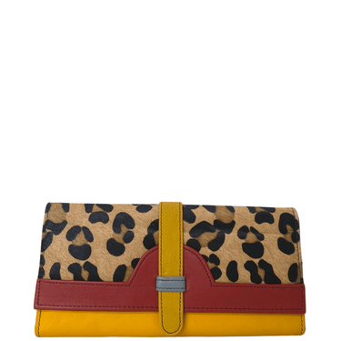 Leopard print clutch bag with yellow and red accents on a white background
