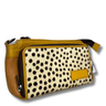 Handbag with polka dot pattern and brown leather accents on a white background
