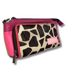 Pink and animal print pouch with a visible brand label on a white background