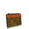 A small zippered card holder or wallet featuring a leopard print hair-on-hide front panel, a solid orange leather top band, and a light sage green base trim, shown on a plain white background.