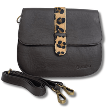 dark brown leather bag with a leopard print strap on a white background