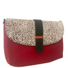 Red handbag with a patterned flap on a white background
