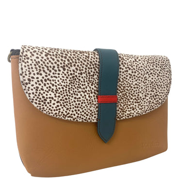 Clutch bag with spotted flap and brown body on a white background